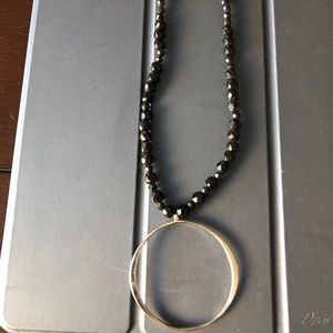 Black Beaded Necklace with hanging silver circle